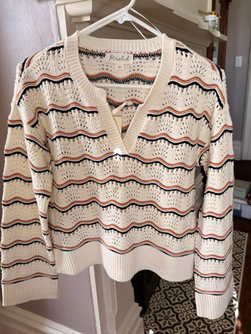 Marled Open-Knit V-Neck Sweater in Cream with Black & Rust Stripes